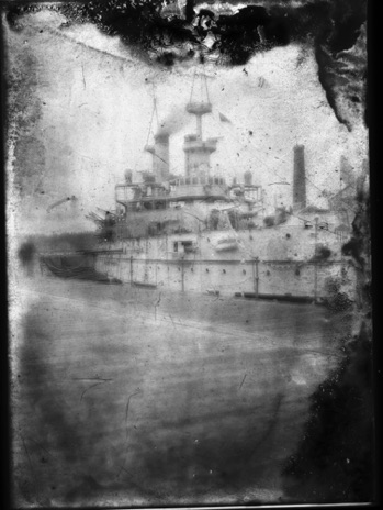 Print from glass plate negative. USS Wisconsin (BB-9) Puget Sound Naval Shipyard in Bremerton. Boat was dry docked here in 1901, 1902 and 1908.